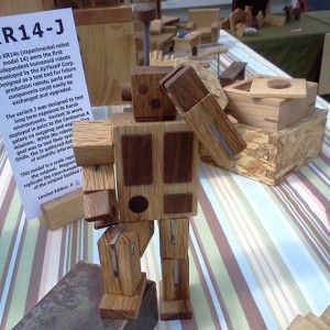 tired wood robot toy after long day of work