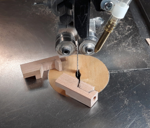 Cutting small pieces of wood on the bandsaw